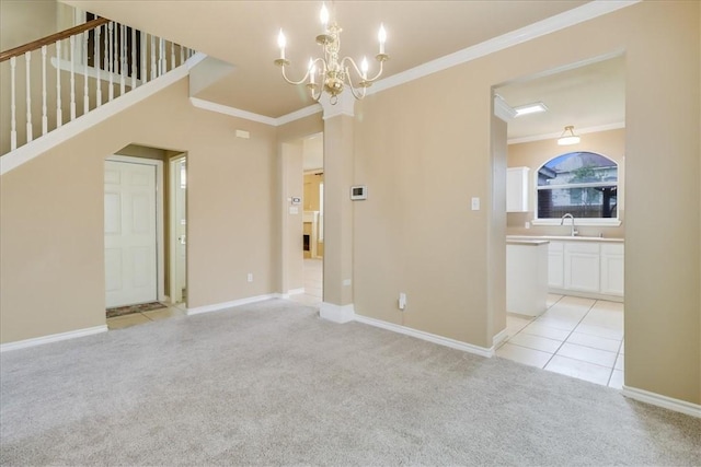 6709 Pembrock, Corpus Christi, TX 78414 - empty room with crown molding, light colored carpet, a chandelier, and baseboards