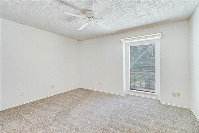 6702 Everhart Unit N102, Corpus Christi, TX 78413 - carpeted spare room with a textured ceiling and ceiling fan