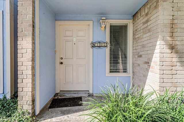 6702 Everhart Unit N102, Corpus Christi, TX 78413 - entrance to property featuring brick siding and stucco siding