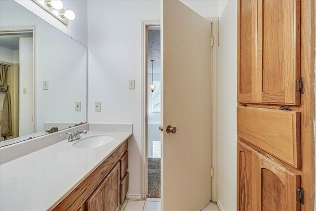 6702 Everhart Unit N102, Corpus Christi, TX 78413 - bathroom featuring vanity and tile patterned flooring