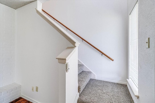 6702 Everhart Unit N102, Corpus Christi, TX 78413 - stairway featuring baseboards