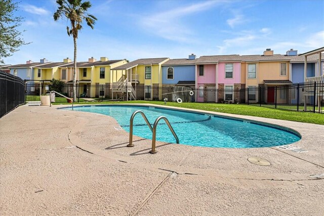 6702 Everhart Unit N102, Corpus Christi, TX 78413 - community pool with a residential view and a patio