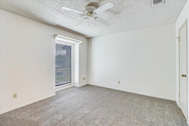 6702 Everhart Unit N102, Corpus Christi, TX 78413 - spare room with carpet, a ceiling fan, and a textured ceiling