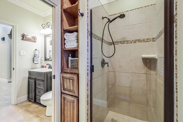 4530 Ballad Tree Dr, Corpus Christi, TX 78410 - bathroom with ornamental molding, a shower stall, vanity, toilet, and tile patterned flooring