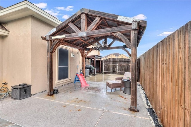 4530 Ballad Tree Dr, Corpus Christi, TX 78410 - view of patio / terrace featuring a fenced backyard and central AC