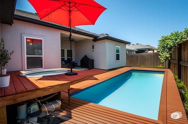 15122 Aquarius St, Corpus Christi, TX 78418 - view of swimming pool featuring a wooden deck and ceiling fan