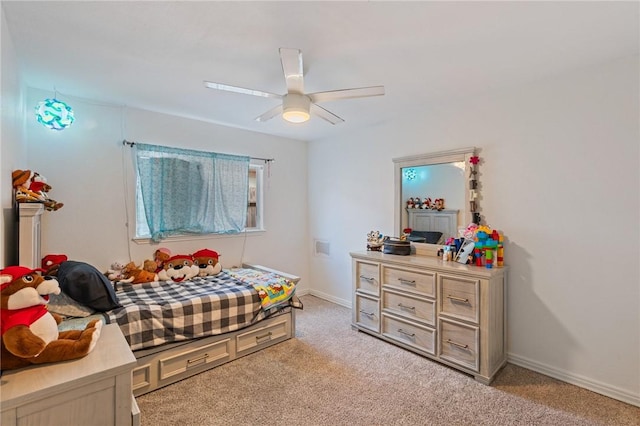 bedroom featuring light carpet and ceiling fan