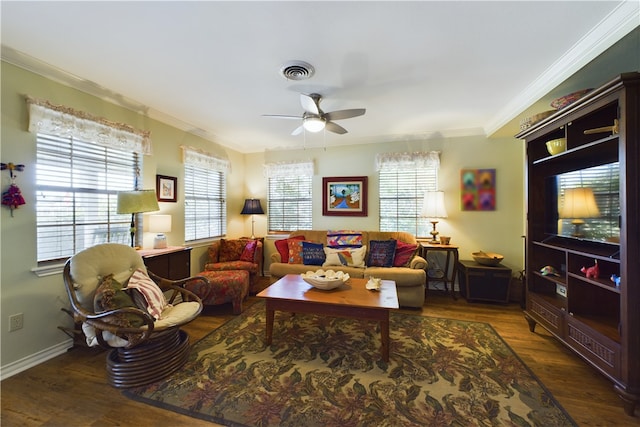 living room with ceiling fan, ornamental molding, dark wood-type flooring, and a wealth of natural light