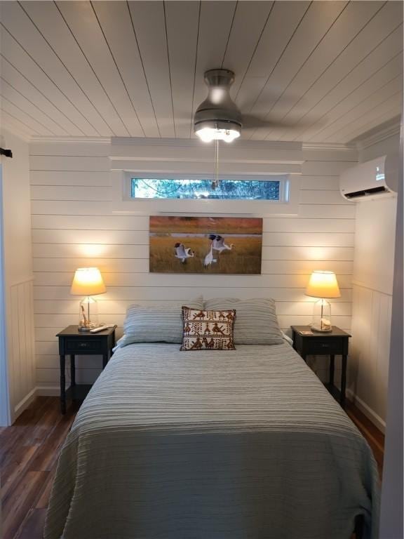 bedroom with ceiling fan, dark wood-type flooring, wooden walls, and a wall mounted AC