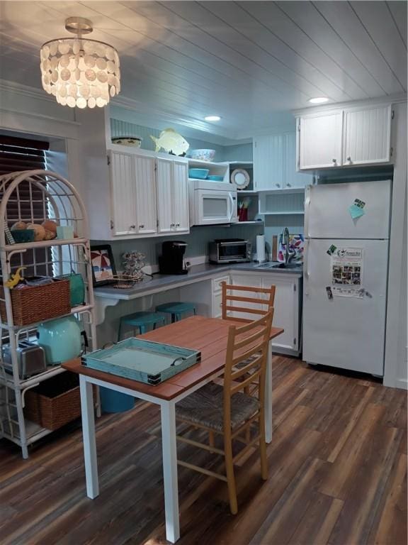 kitchen featuring white cabinets, white appliances, dark hardwood / wood-style floors, and wooden ceiling