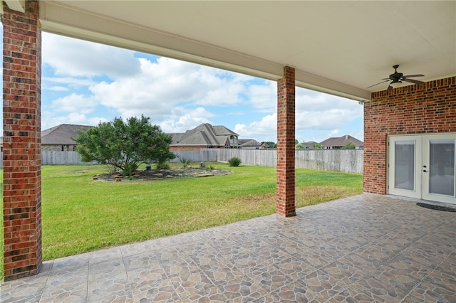 view of patio / terrace with ceiling fan and french doors