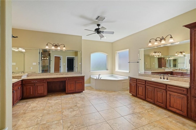 bathroom with vanity, ceiling fan, plus walk in shower, and tile patterned flooring