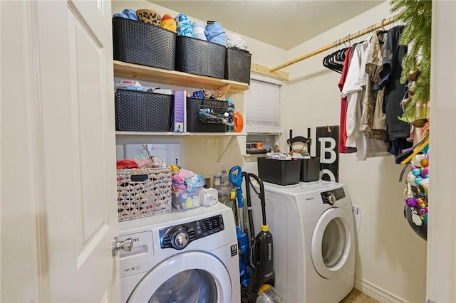 6205 Londonderry Dr, Corpus Christi, TX 78415 - laundry area with washer and dryer and baseboards