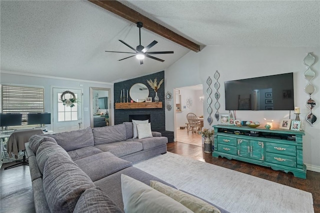 6205 Londonderry Dr, Corpus Christi, TX 78415 - living area featuring a ceiling fan, a textured ceiling, and dark wood-style flooring