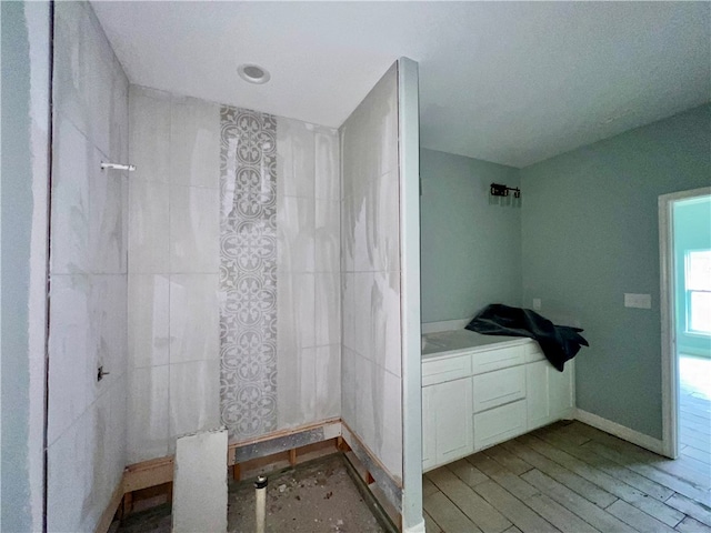 bathroom featuring wood-type flooring