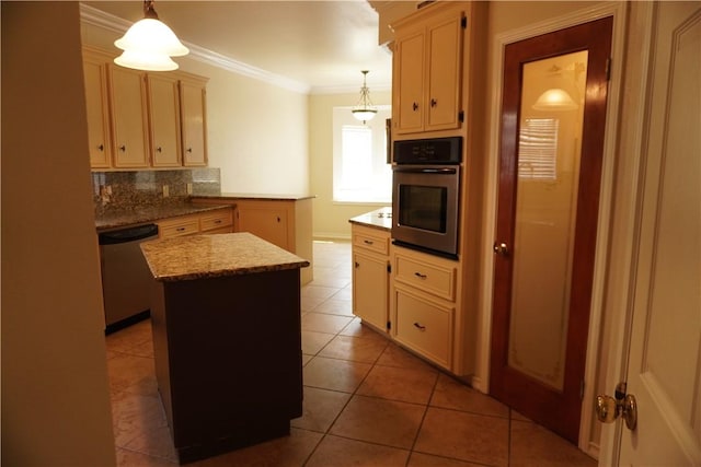 kitchen featuring a kitchen island, appliances with stainless steel finishes, tile patterned flooring, decorative backsplash, and ornamental molding
