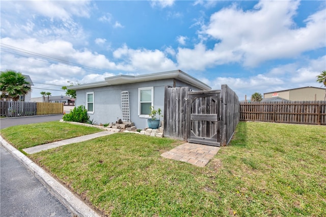 exterior space with a lawn