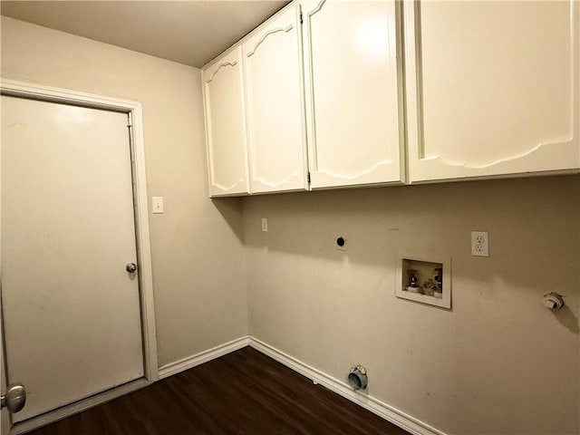 washroom with dark wood-type flooring, cabinets, hookup for an electric dryer, and hookup for a washing machine