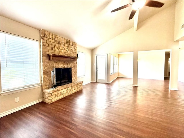 3325 Hampton St, Corpus Christi, TX 78414 - unfurnished living room with a fireplace, wood finished floors, a ceiling fan, and high vaulted ceiling