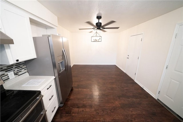 kitchen with ceiling fan, appliances with stainless steel finishes, tasteful backsplash, dark hardwood / wood-style flooring, and white cabinetry