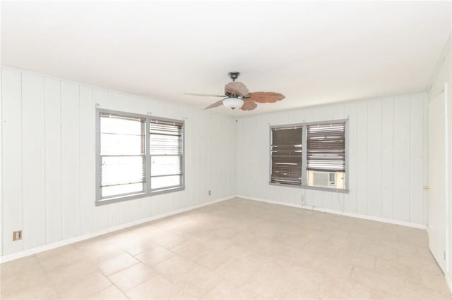 spare room with ceiling fan