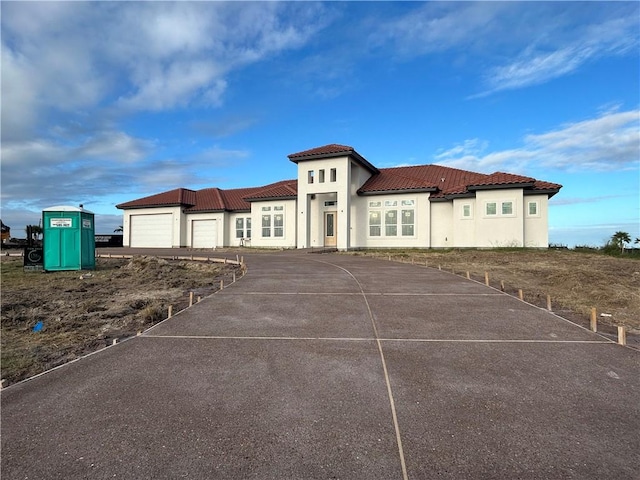 view of front of home featuring a garage