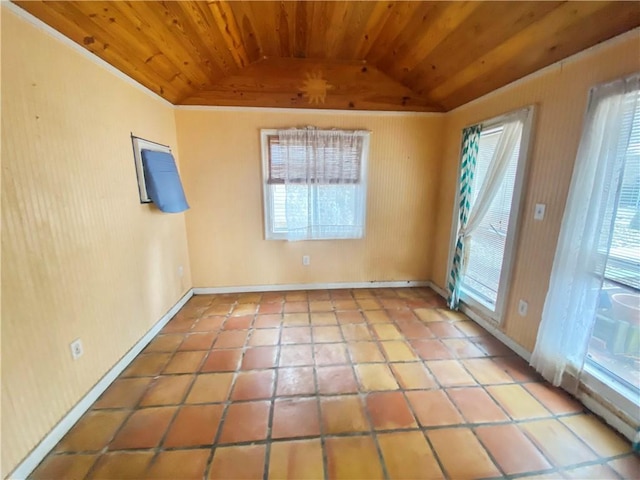 tiled spare room with vaulted ceiling and wooden ceiling