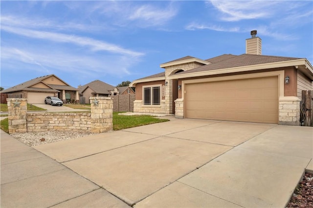 view of front of property with a garage