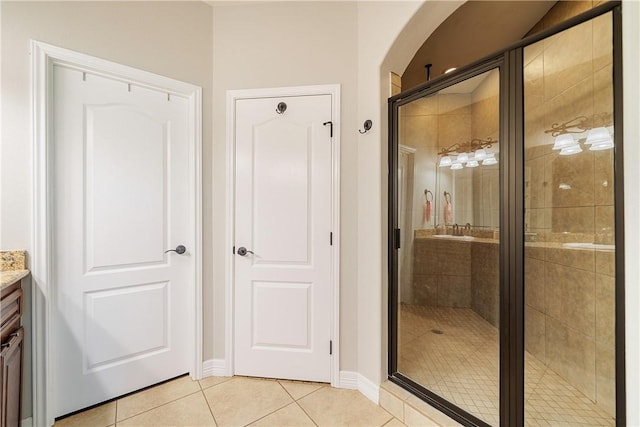 11330 Brendel, Corpus Christi, TX 78410 - full bathroom featuring tile patterned flooring, vanity, and a shower stall