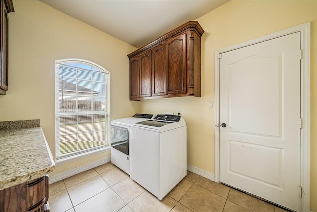 11330 Brendel, Corpus Christi, TX 78410 - laundry room featuring cabinet space, separate washer and dryer, and light tile patterned flooring