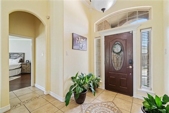 11330 Brendel, Corpus Christi, TX 78410 - entrance foyer with tile patterned flooring, a high ceiling, and arched walkways