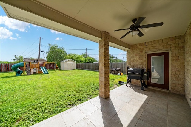 11330 Brendel, Corpus Christi, TX 78410 - fenced backyard featuring a shed, ceiling fan, area for grilling, a patio, and a playground