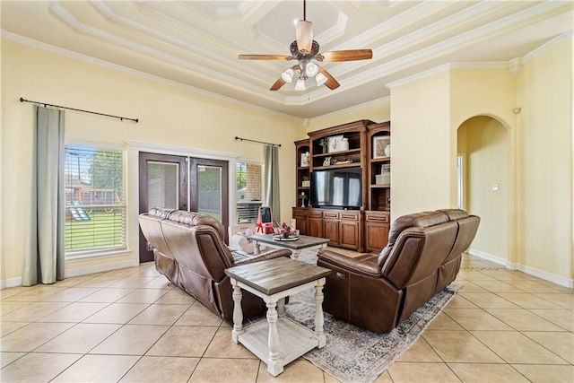11330 Brendel, Corpus Christi, TX 78410 - living area with light tile patterned floors, ornamental molding, plenty of natural light, french doors, and arched walkways
