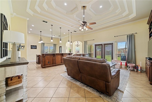 11330 Brendel, Corpus Christi, TX 78410 - living area with healthy amount of natural light, light tile patterned floors, a ceiling fan, a raised ceiling, and ornamental molding