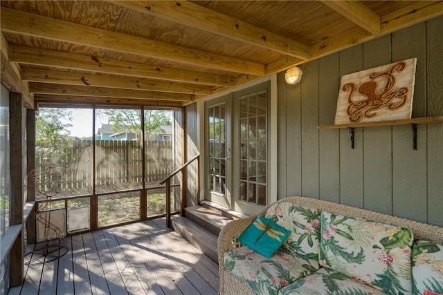 sunroom / solarium featuring wooden ceiling and beamed ceiling