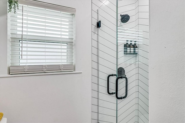 room details with an enclosed shower