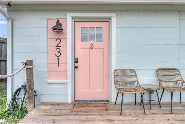 doorway to property with a wooden deck