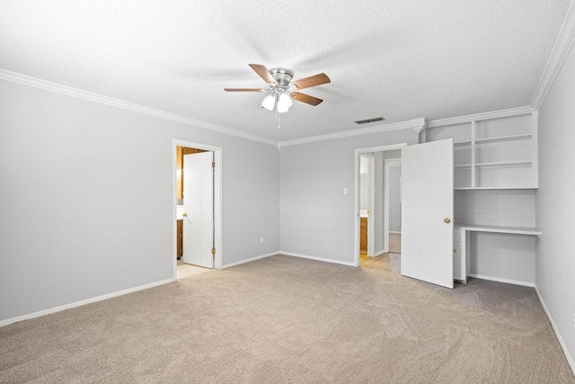 10710 Atlanta St, Corpus Christi, TX 78410 - unfurnished bedroom featuring crown molding, light carpet, a textured ceiling, baseboards, and ceiling fan