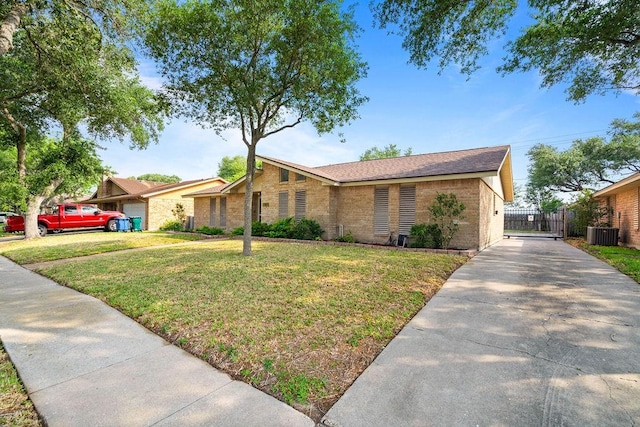 10710 Atlanta St, Corpus Christi, TX 78410 - mid-century modern home with brick siding and cooling unit