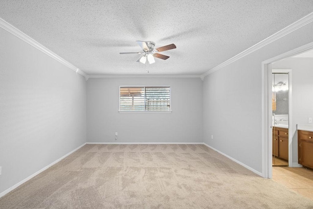 10710 Atlanta St, Corpus Christi, TX 78410 - spare room with ceiling fan, light colored carpet, ornamental molding, and a textured ceiling