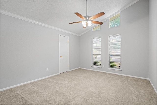 10710 Atlanta St, Corpus Christi, TX 78410 - carpeted spare room featuring ceiling fan, a textured ceiling, vaulted ceiling, crown molding, and baseboards