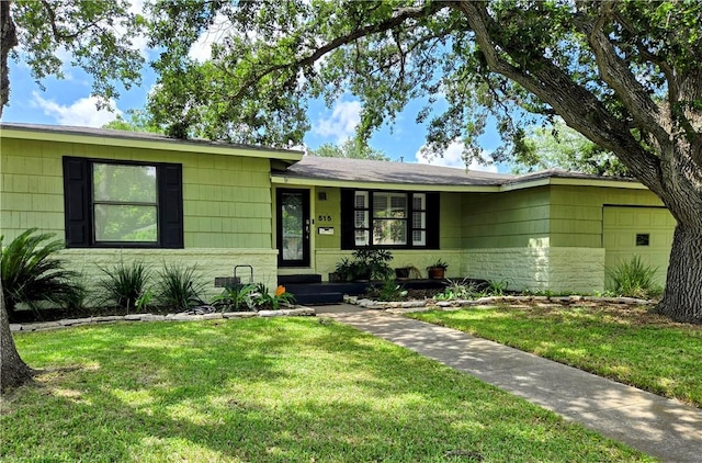 515 Deforrest St, Corpus Christi, TX 78404 - ranch-style house featuring a front lawn and a garage