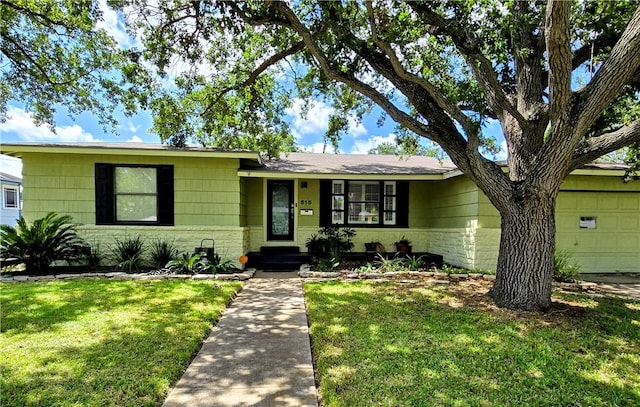 515 Deforrest St, Corpus Christi, TX 78404 - single story home featuring a front yard and an attached garage