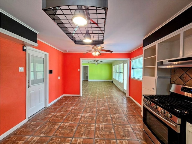 515 Deforrest St, Corpus Christi, TX 78404 - kitchen with gas range, ceiling fan, under cabinet range hood, brick patterned floors, and crown molding
