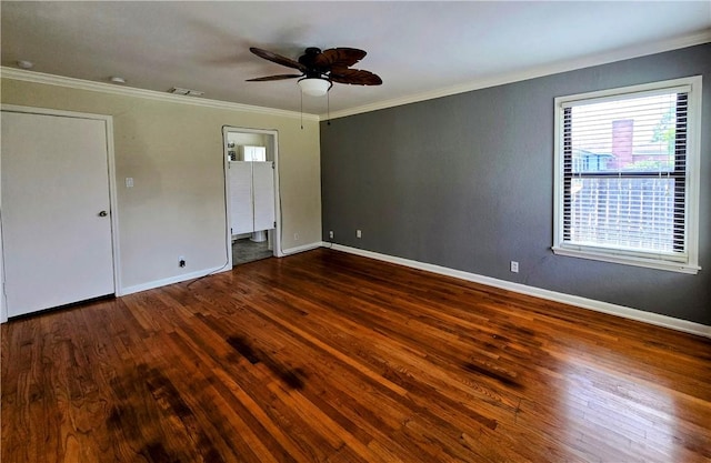 515 Deforrest St, Corpus Christi, TX 78404 - unfurnished bedroom featuring wood finished floors, crown molding, a ceiling fan, and ensuite bathroom