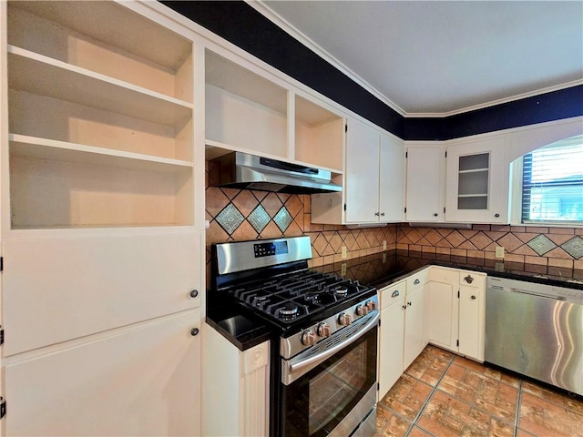 515 Deforrest St, Corpus Christi, TX 78404 - kitchen with stainless steel appliances, under cabinet range hood, dark countertops, decorative backsplash, and crown molding