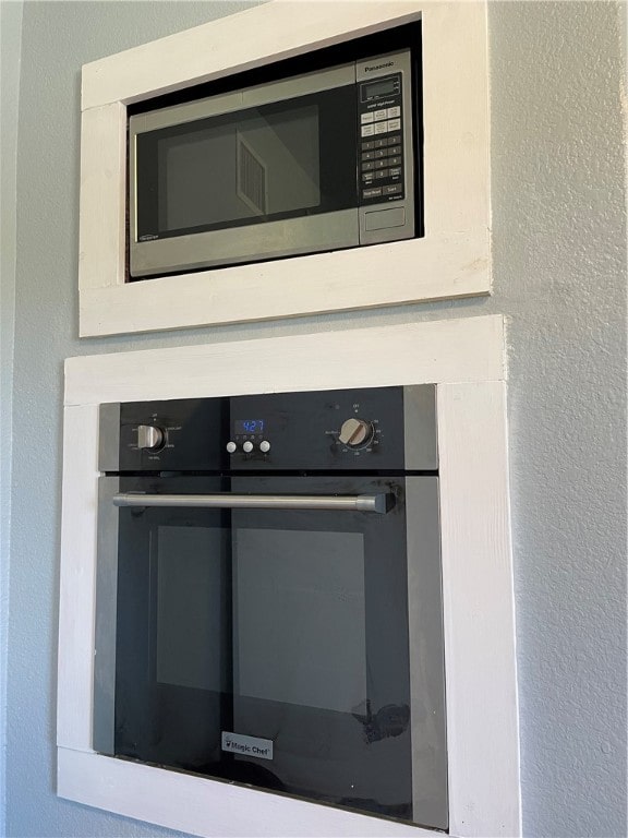 343 Bracht, Rockport, TX 78382 - detailed view of stainless steel microwave and a textured wall