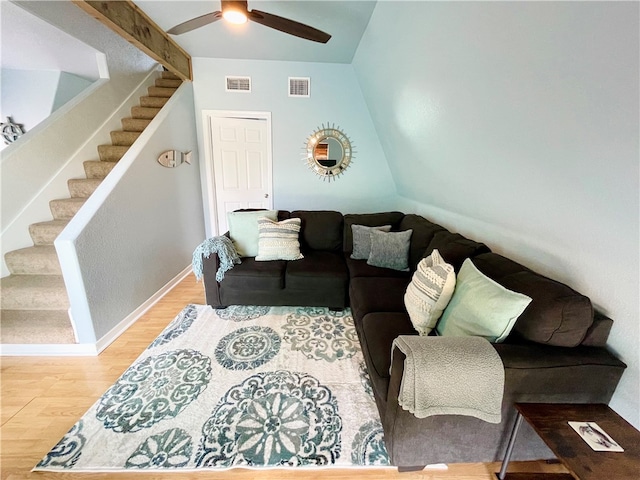 343 Bracht, Rockport, TX 78382 - living area with stairway, wood finished floors, ceiling fan, and baseboards