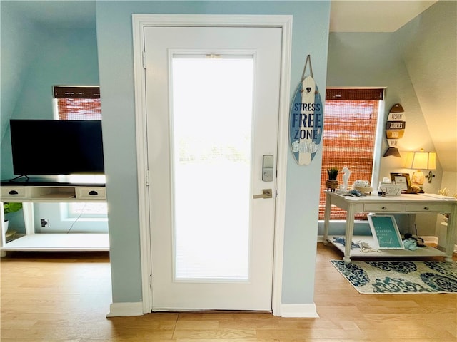 343 Bracht, Rockport, TX 78382 - entryway with wood finished floors, an office area, and baseboards