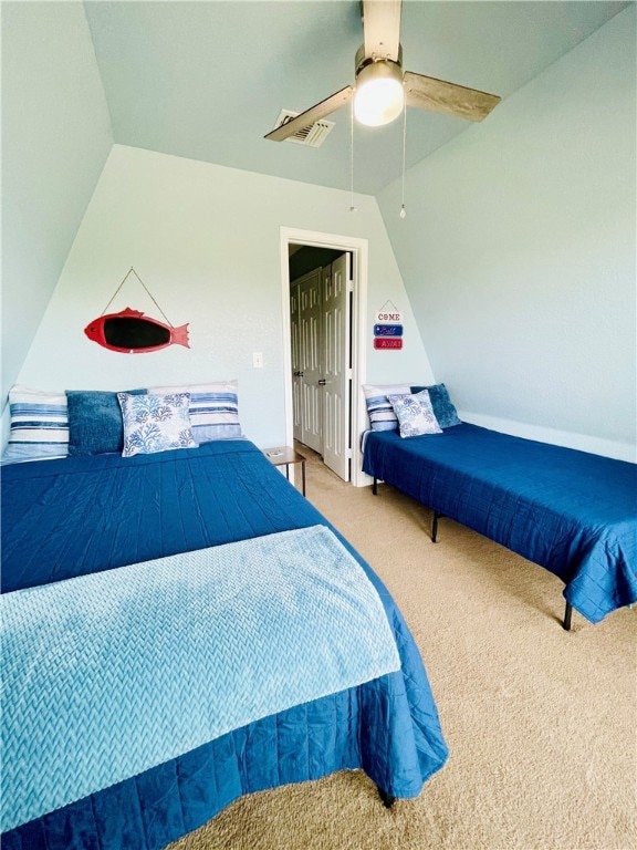 343 Bracht, Rockport, TX 78382 - carpeted bedroom featuring lofted ceiling, ceiling fan, and baseboards